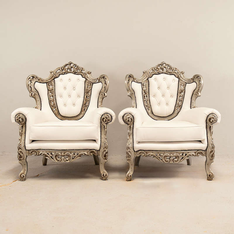 Carved Leather Armchairs