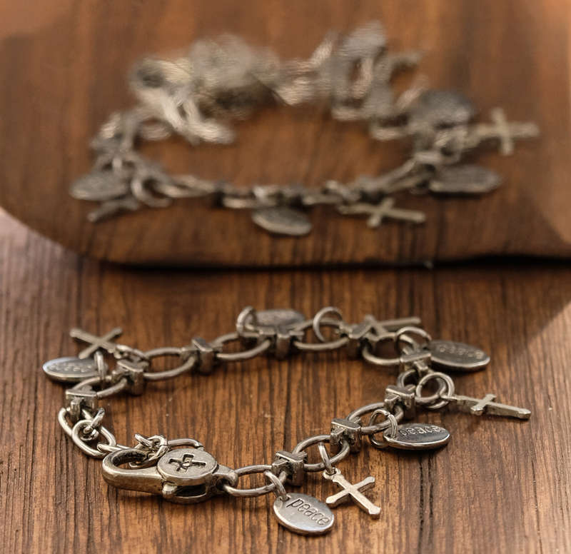 Silver Tone Bracelet With Cross And Peace Charms, Adjustable #ML211 R60.00 | Dimensions: 110mm by