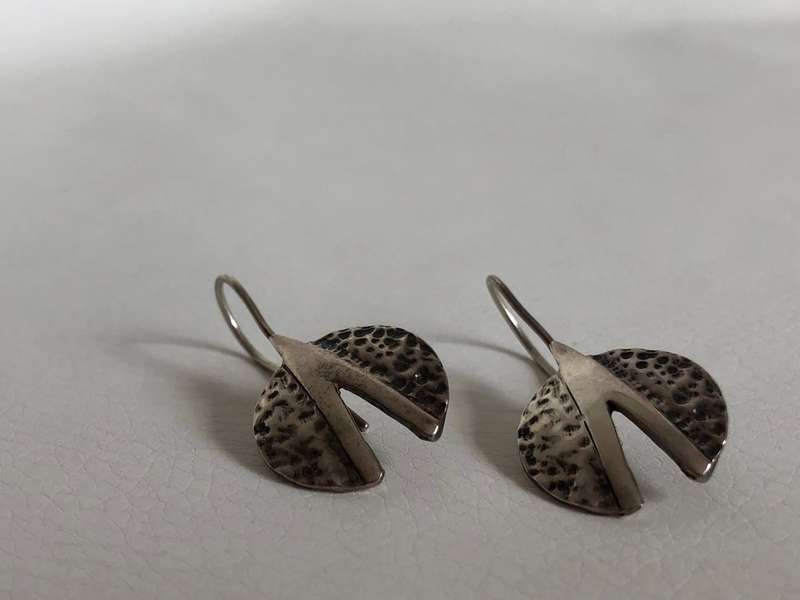 .925 Silver Earrings With a V split and half moon dimpled shapes #ML465 R295.00 | Dimensions: 35m...