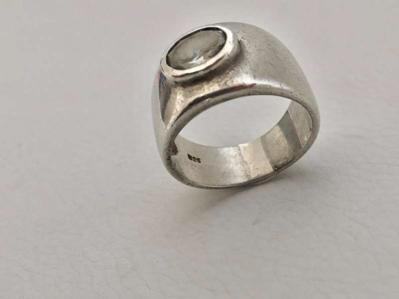 925 Silver Wide Band with Oval White Stone Set in #ML508 R695.00 | Dimensions: Ring Size T1/2