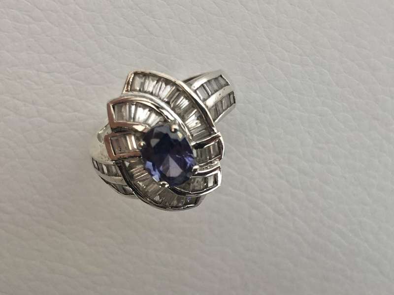 Silver Ring With Oval Shape, Lines of Diamante Type Stones, Oval Purple/Blue Stone #ML552 R695.00...