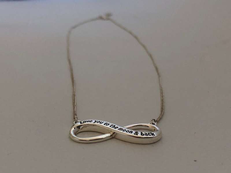 Silver Plated Necklace With Infinity Pendant With "Love you to the moon and back" Inscription. Ma...