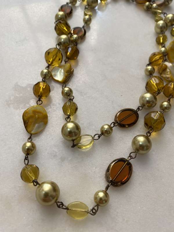 Long Gold Coloured Beaded Necklace #ML663 R165.00 | Dimensions: 790mm Diameter
