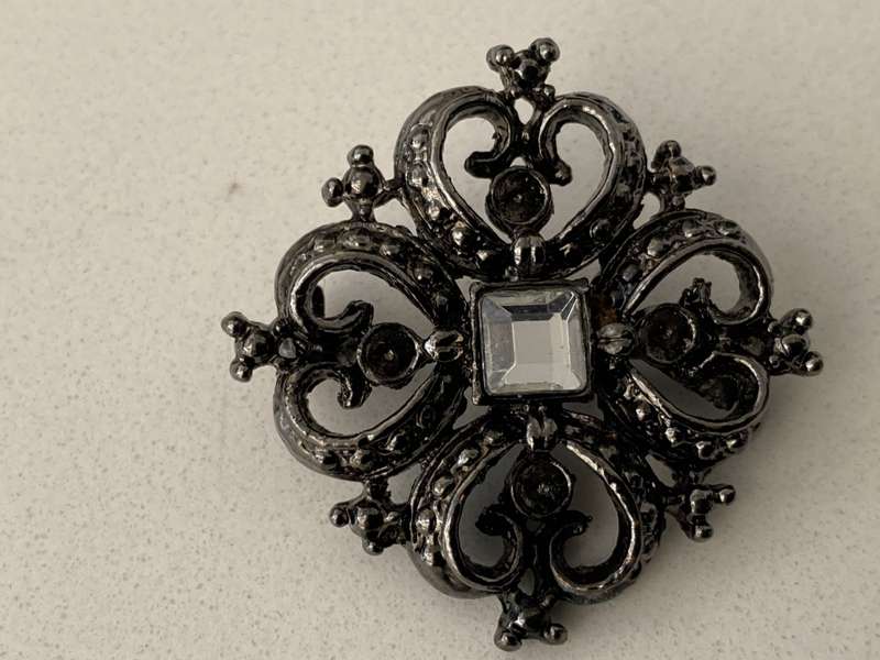 Brooch - Black Colour Square With Heart Shapes. Has A White Bead in Centre #ML681