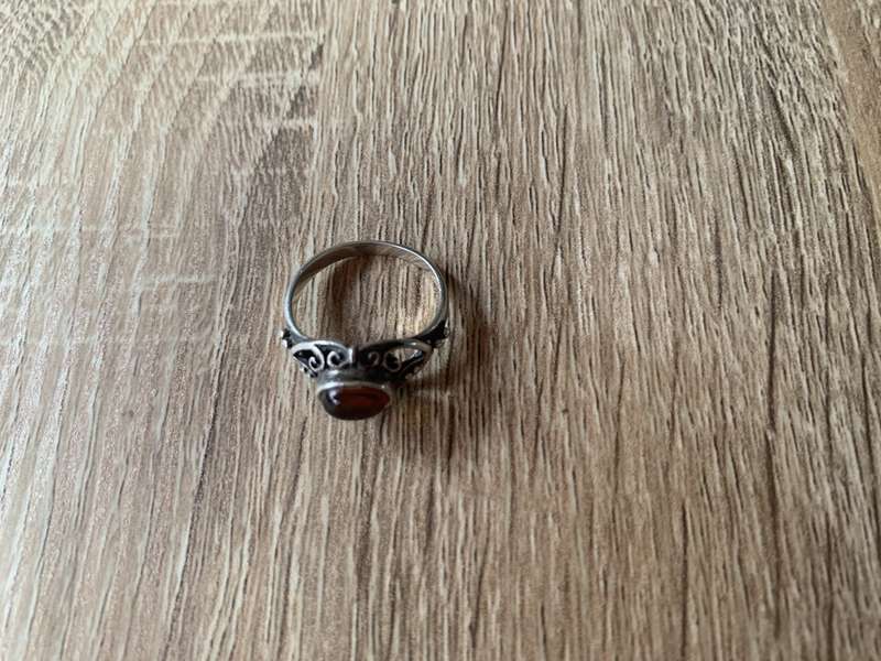 925 Silver Ring With Orange Stone On Raised Setting Surrounded By Swirls #ML700R195.00 | Dimensi...