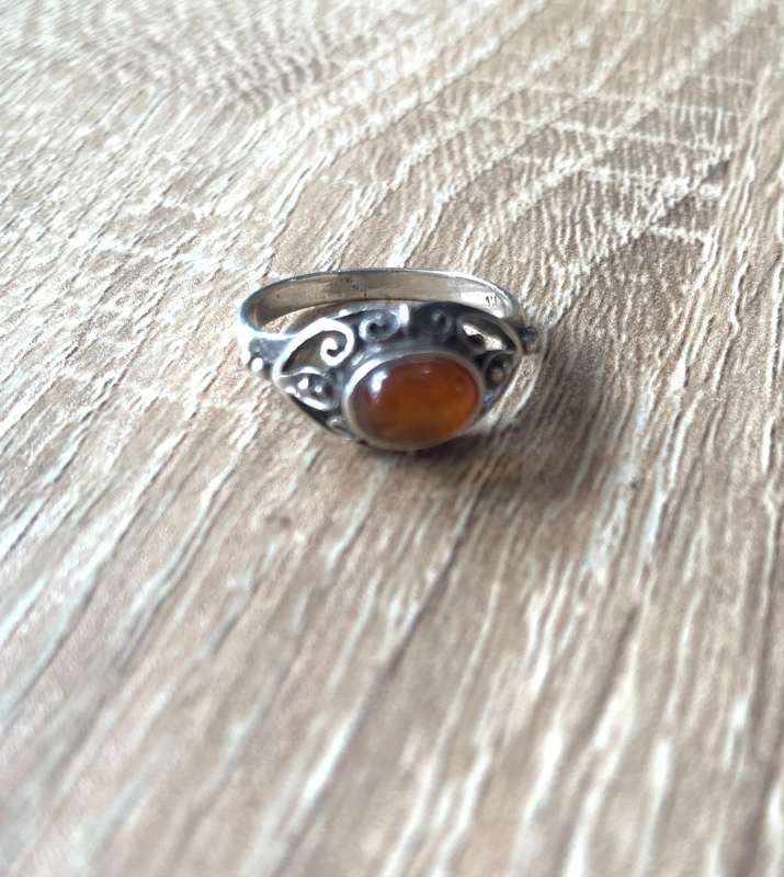 925 Silver Ring With Orange Stone On Raised Setting Surrounded By Swirls #ML700R195.00 | Dimensi...