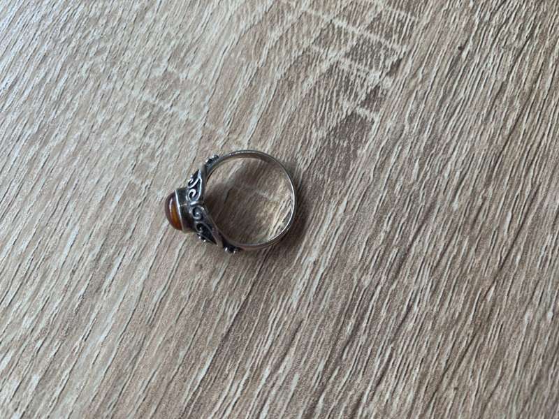 925 Silver Ring With Orange Stone On Raised Setting Surrounded By Swirls #ML700R195.00 | Dimensi...