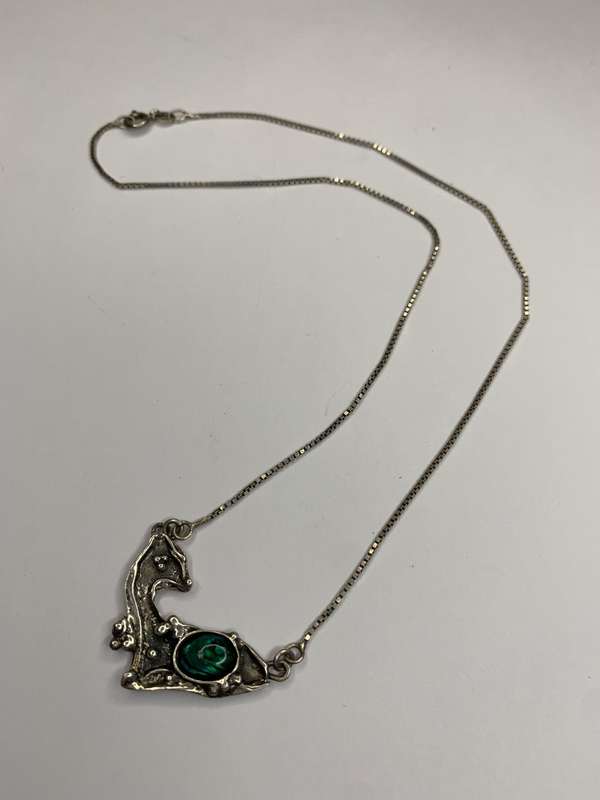 Necklace - 925 Silver Fawn Shaped Pendant on Chain. The pendant has silver bobbles and green ston...