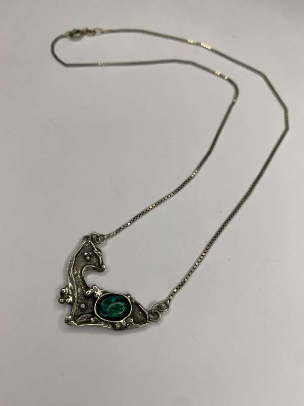 Necklace - 925 Silver Fawn Shaped Pendant on Chain. The pendant has silver bobbles and green ston...