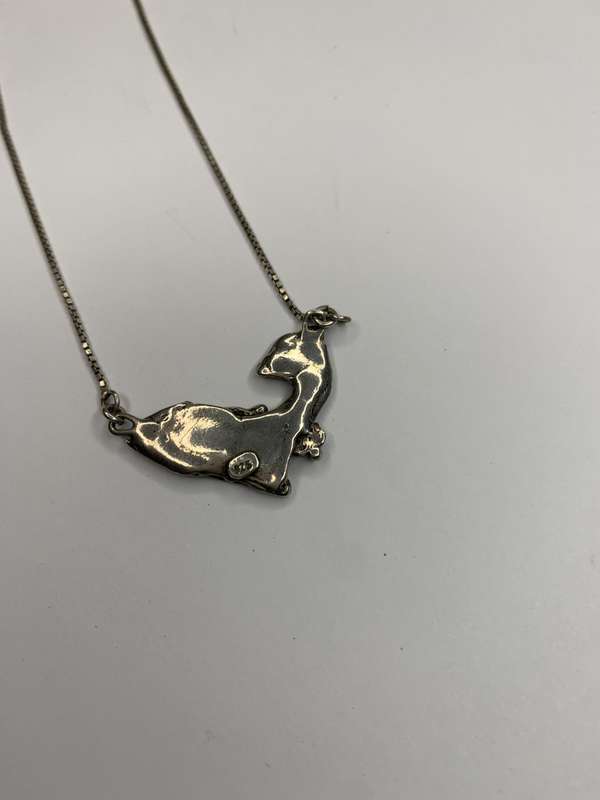 Necklace - 925 Silver Fawn Shaped Pendant on Chain. The pendant has silver bobbles and green ston...