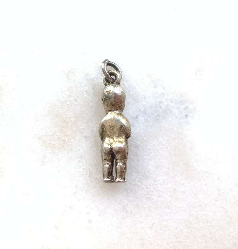 Silver Coloured Young Boy With One Arm Folded and One Hand To Mouth #ML776 R180.00 | Dimensions: ...
