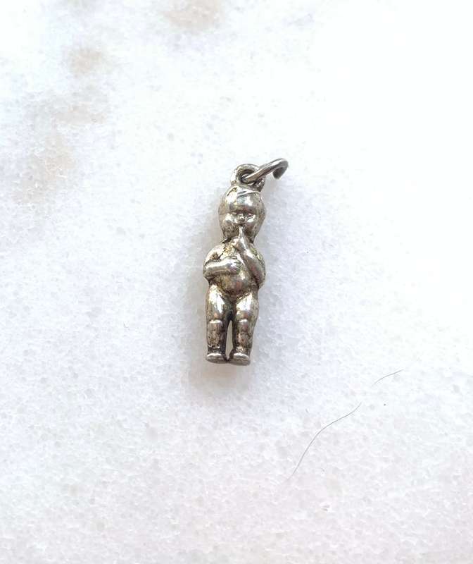 Silver Coloured Young Boy With One Arm Folded and One Hand To Mouth #ML776 R180.00 | Dimensions: ...