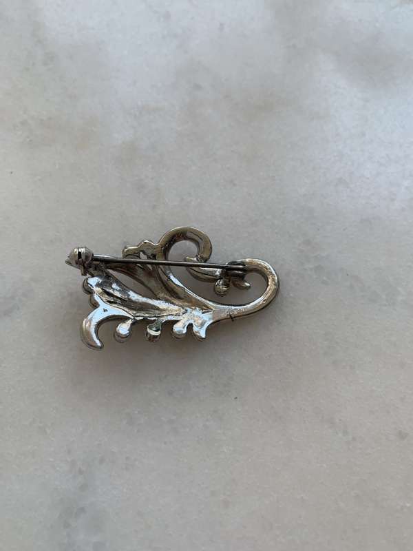 Silver Toned Marcasite Brooch With Flower Pattern #ML804  Dimensions: 44mm x 24mm
