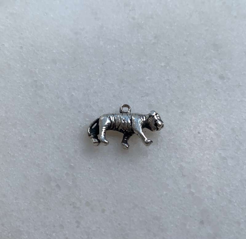 Silver Tiger Charm With Engraved Markings #ML812 R180.00 | Dimensions: 19mm x 10mm