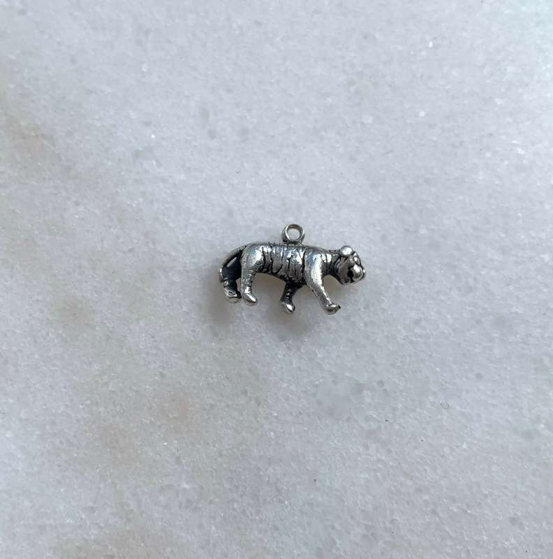 Silver Tiger Charm With Engraved Markings #ML812 R180.00 | Dimensions: 19mm x 10mm