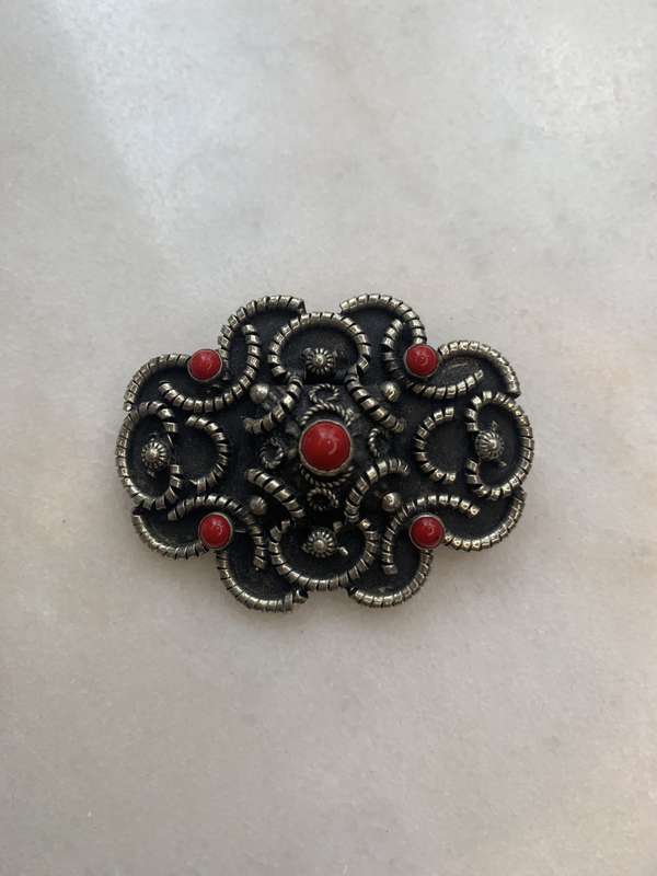 Brooch - Black Colouring, Semi Circular Cords of Pattern With 5 Round Red Stone Style Insets. Sil...