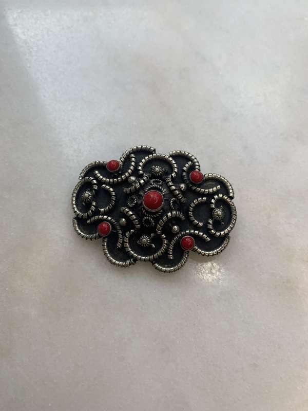 Brooch - Black Colouring, Semi Circular Cords of Pattern With 5 Round Red Stone Style Insets. Sil...
