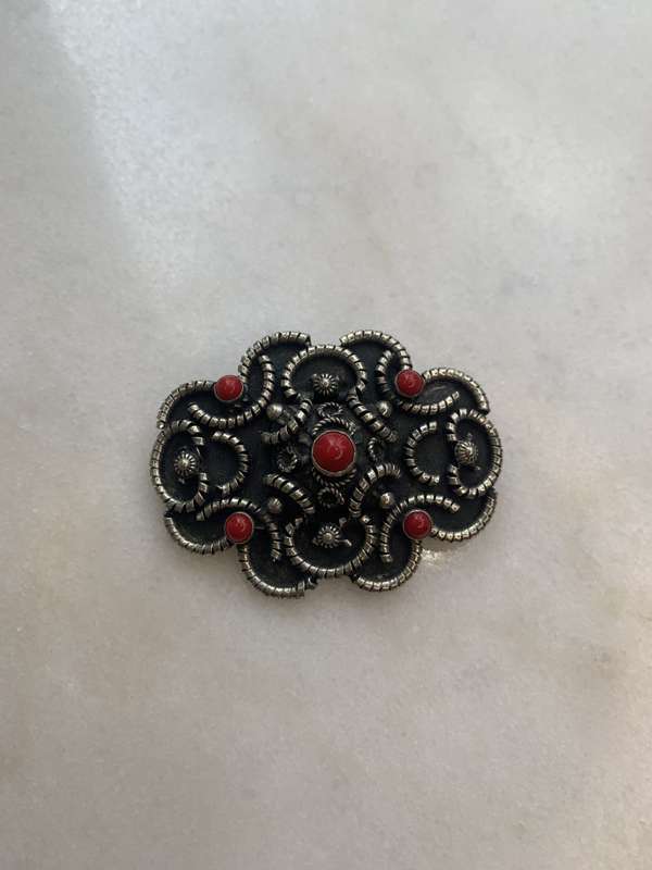 Brooch - Black Colouring, Semi Circular Cords of Pattern With 5 Round Red Stone Style Insets. Sil...