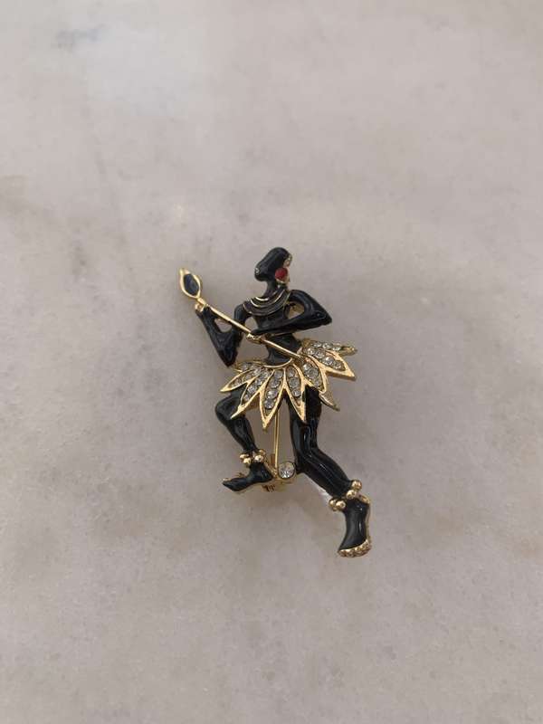 Gold & Black Metal African Dancer Brooch With White Diamante #ML878 R295.00 | Dimensions: 64mm x ...