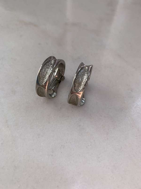 Solid Silver Colour Clip-On Hoop Earrings - Engraved Insets #ML885 R195.00 | Dimensions: 23mm x 24mm