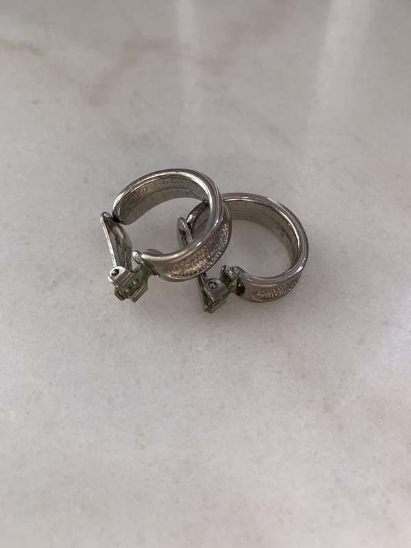 Solid Silver Colour Clip-On Hoop Earrings - Engraved Insets #ML885 R195.00 | Dimensions: 23mm x 24mm