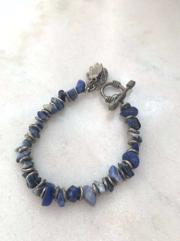 Bracelet With Irregular Shaped Blue Stones Split By Silver Coloured Round Beads With Pretty Clasp...