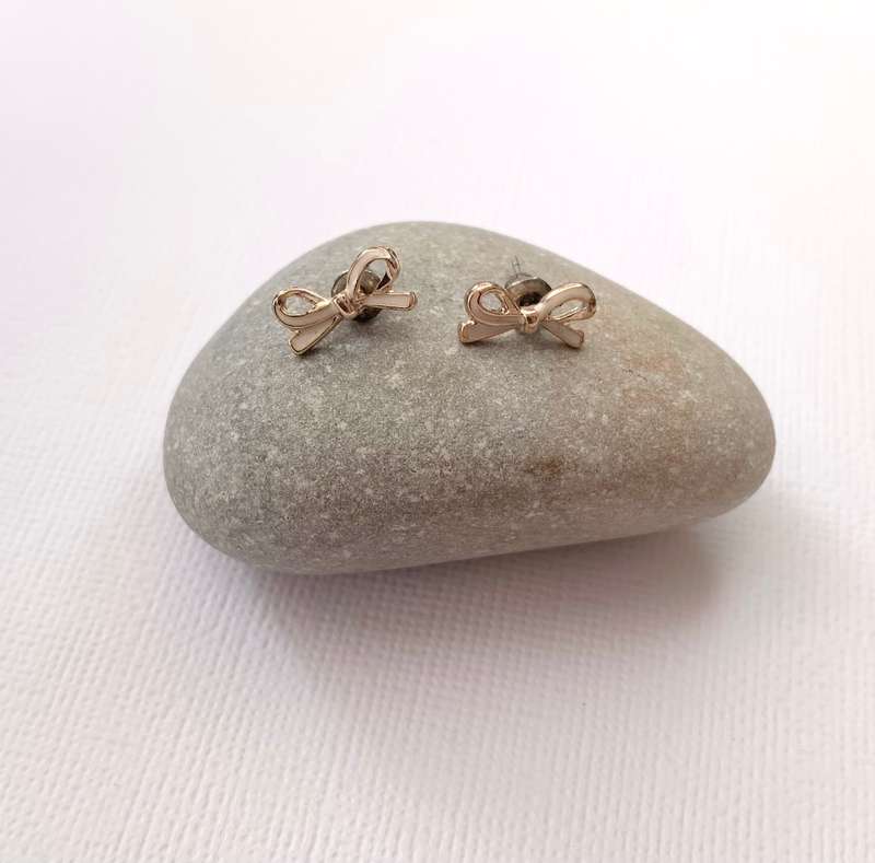 Earrings - Bow Studs. Rose Gold and White Colour #ML1011 R180.00 | Dimensions: 10mm x 5mm