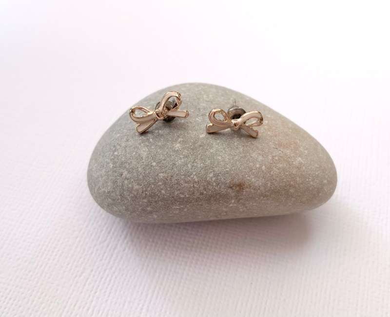 Earrings - Bow Studs. Rose Gold and White Colour #ML1011 R180.00 | Dimensions: 10mm x 5mm
