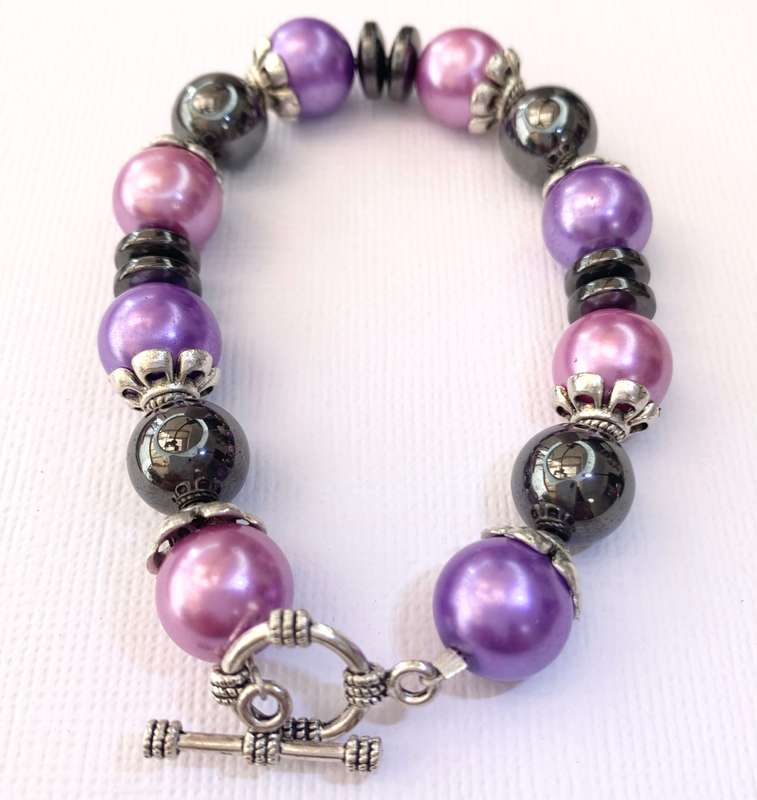 Bracelet - Pink, Purple, Black Beads With Silver Fittings On Wire With Silver Colour Clasp. Bit o...