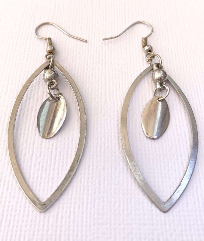 Earrings - Eye Shaped Cut Out Earrings With Dangling Oval. Silver Colour #ML1025 R195.00 | Dimens...