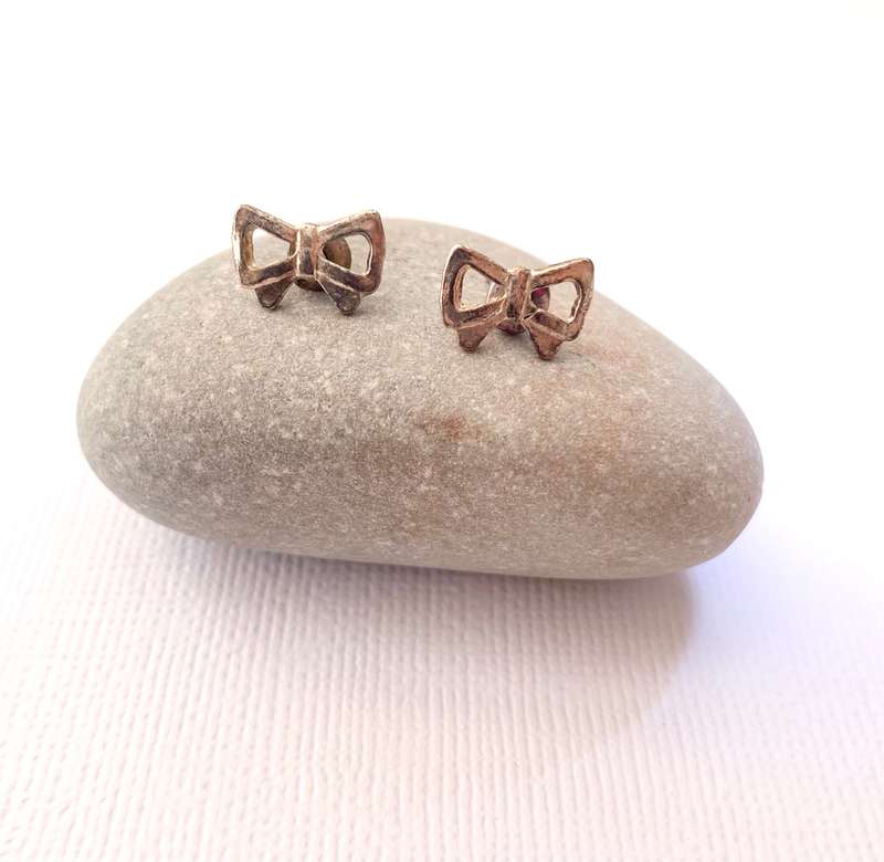 Earrings - Bow Stud Earrings. Gold Coloured#ML1027 R180.00 | Dimensions: 5 x 10mm