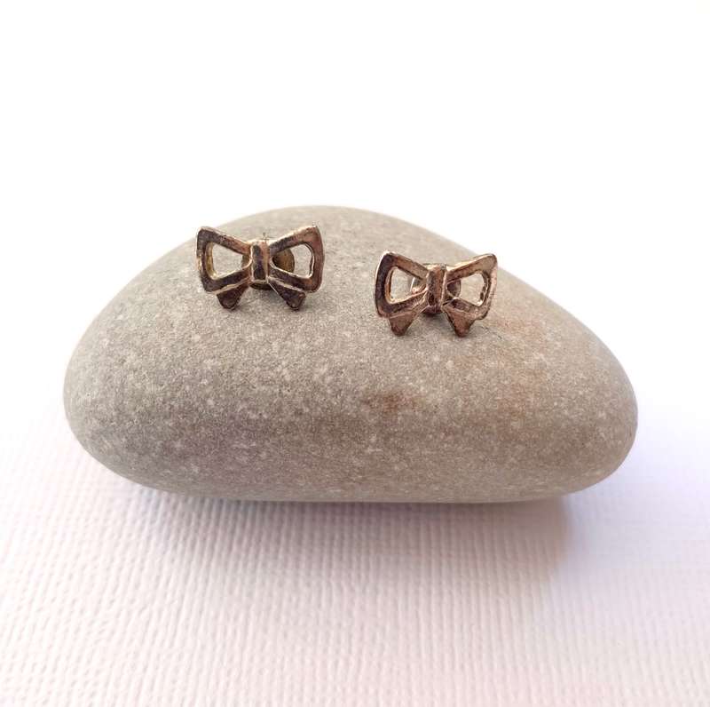 Earrings - Bow Stud Earrings. Gold Coloured#ML1027 R180.00 | Dimensions: 5 x 10mm