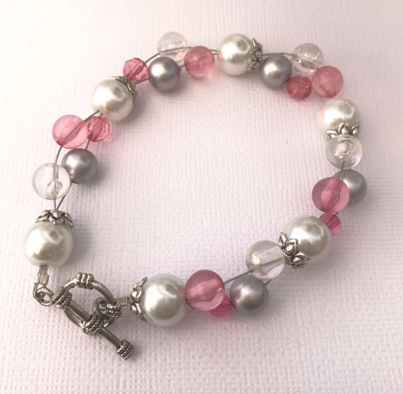 Necklace & Bracelet Set - Round Pink, White and Silver Studded Beads #ML1029 R220.00 | Dimensions...