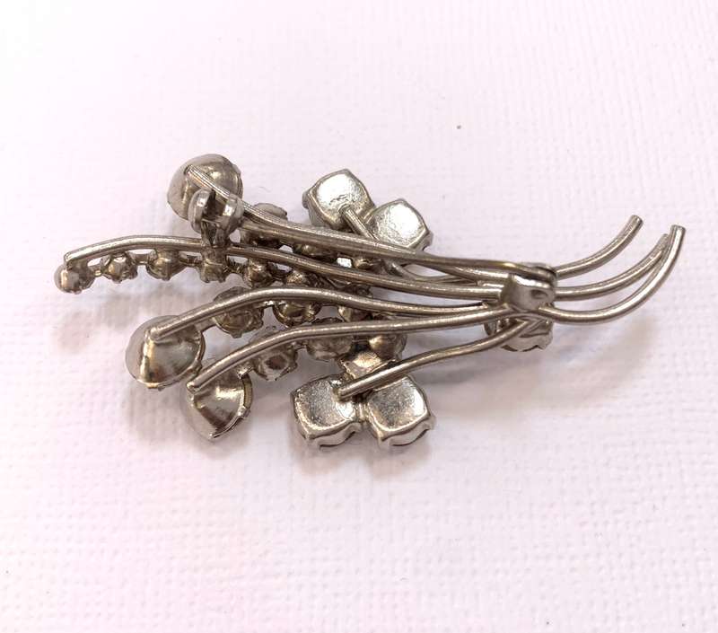 Brooch - Flower Bunch With Diamante Stones. Silver Colour #ML1044 R295.00 | Dimensions: 60mm x 30mm