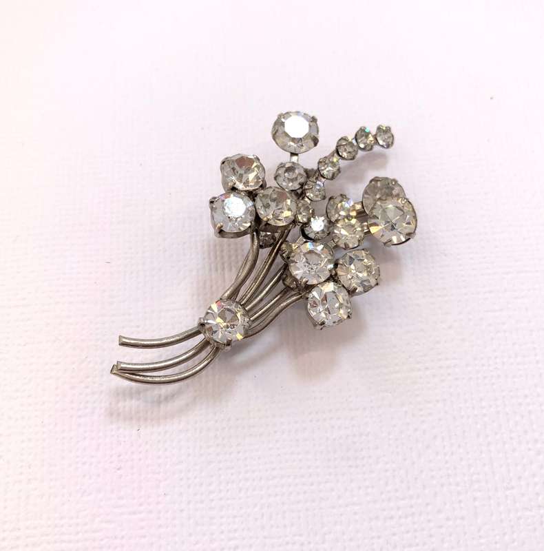 Brooch - Flower Bunch With Diamante Stones. Silver Colour #ML1044 R295.00 | Dimensions: 60mm x 30mm