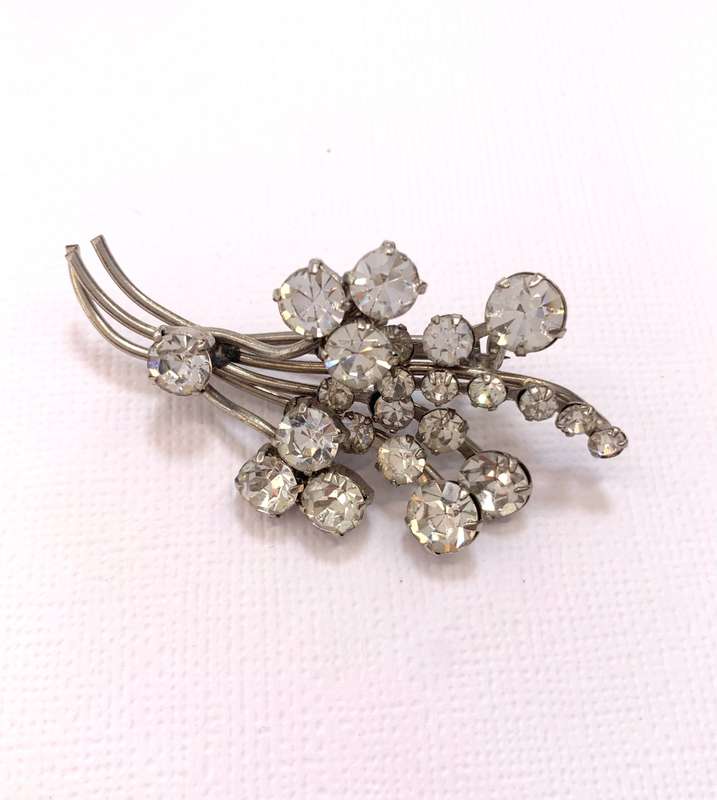 Brooch - Flower Bunch With Diamante Stones. Silver Colour #ML1044 R295.00 | Dimensions: 60mm x 30mm