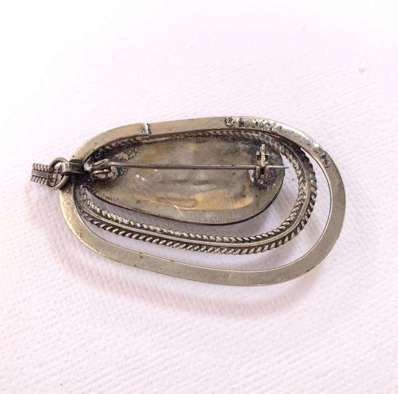 Brooch - Oval Green Stone Surrounded By Silver Oval Cutouts. Silver Coloured #ML1056 R495.00 | Di...