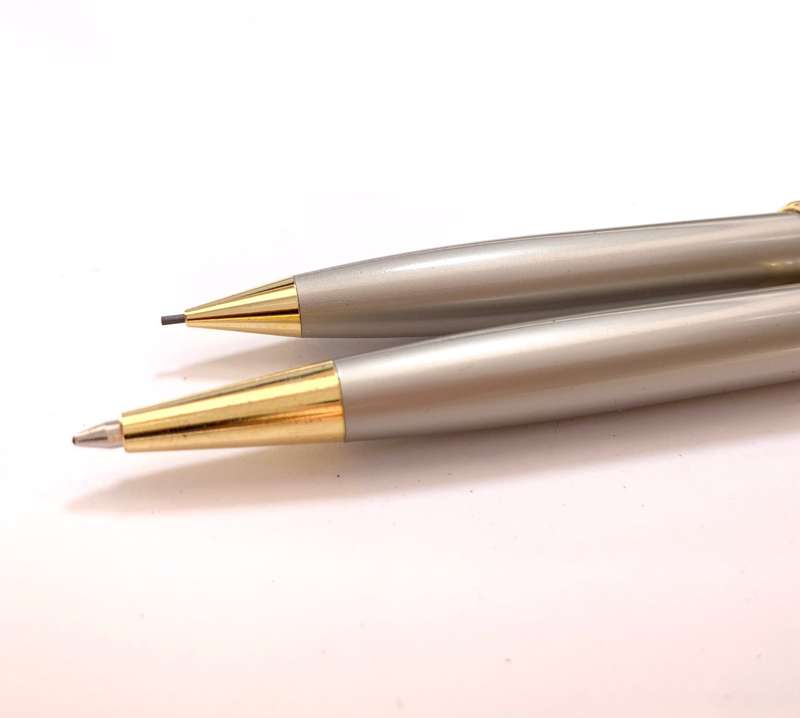 Pen Set - Ballpoint and Clutch Pencil. Brand Novartis Presentation. Gold and Silver Colour. Inscr...