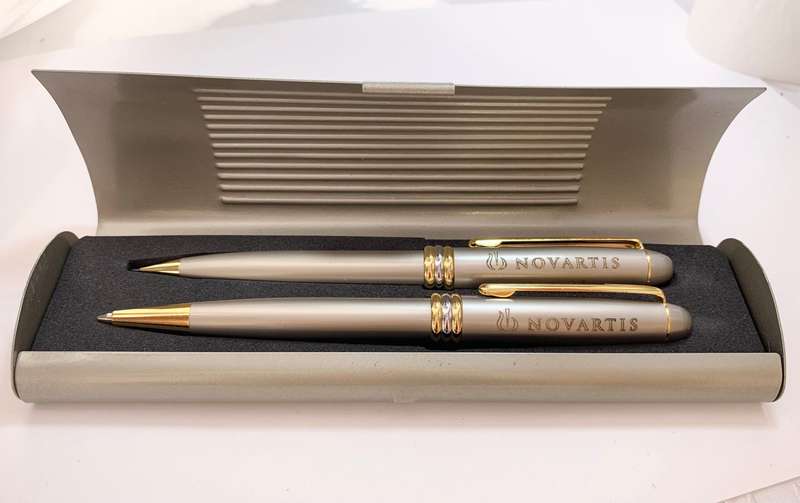 Pen Set - Ballpoint and Clutch Pencil. Brand Novartis Presentation. Gold and Silver Colour. Inscr...