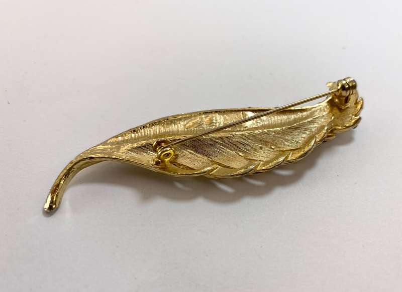 Brooch - Leaf Brooch With Diamante, Gold Coloured #ML1198 R295.00 | Dimensions: 80mm x 22mm