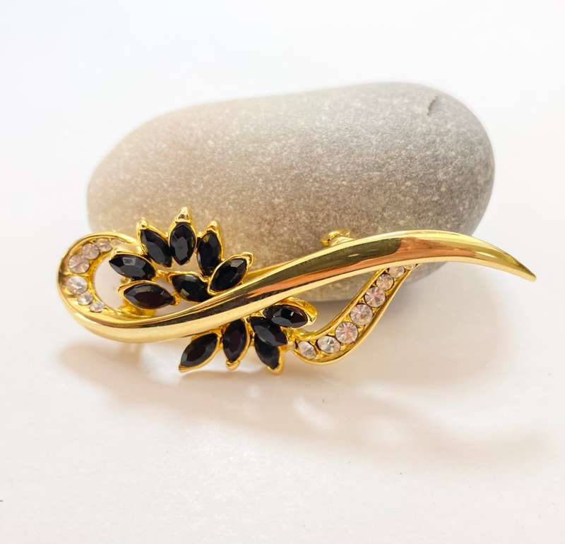 Brooch - Black and Clear Diamante On Leafy Pattern. Gold Coloured #ML1231 R295.00 | Dimensions: 6...