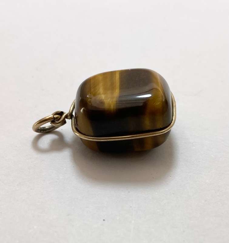 Pendant - Tigers Eye Semi-Precious Polished Stone. Gold Colour Link #ML1260 R250.00 | Dimensions:...