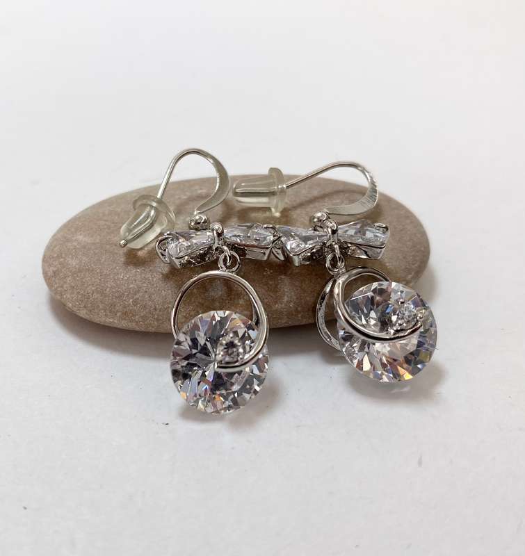 Earrings - Drops with Large Clear Stone & Bow Shape. Silver Colour #ML1261 R195.00 | Dimensions: ...