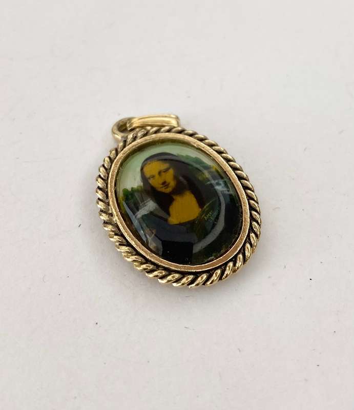 Pendant - Portrait of Mona Lisa Surrounded By Rope Detail. Gold Coloured #ML1263 R320.00 | Dimens...