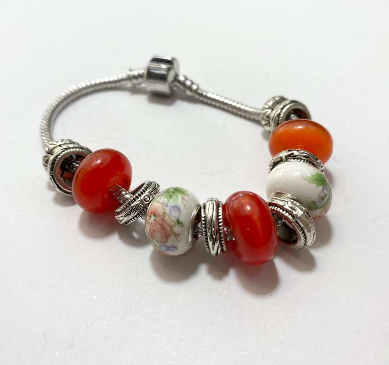 Bracelet - Orange Colour & Flower Decorated Beads. Silver Colour #ML1390