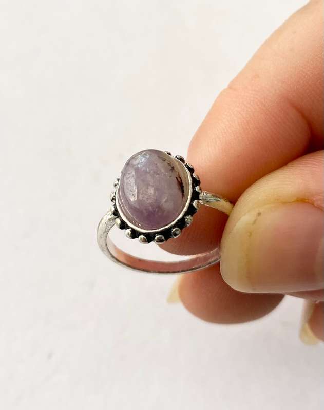 Ring - Band With Central Amethyst Stone Set on Silver Colour Plate. Silver Colour #ML1397