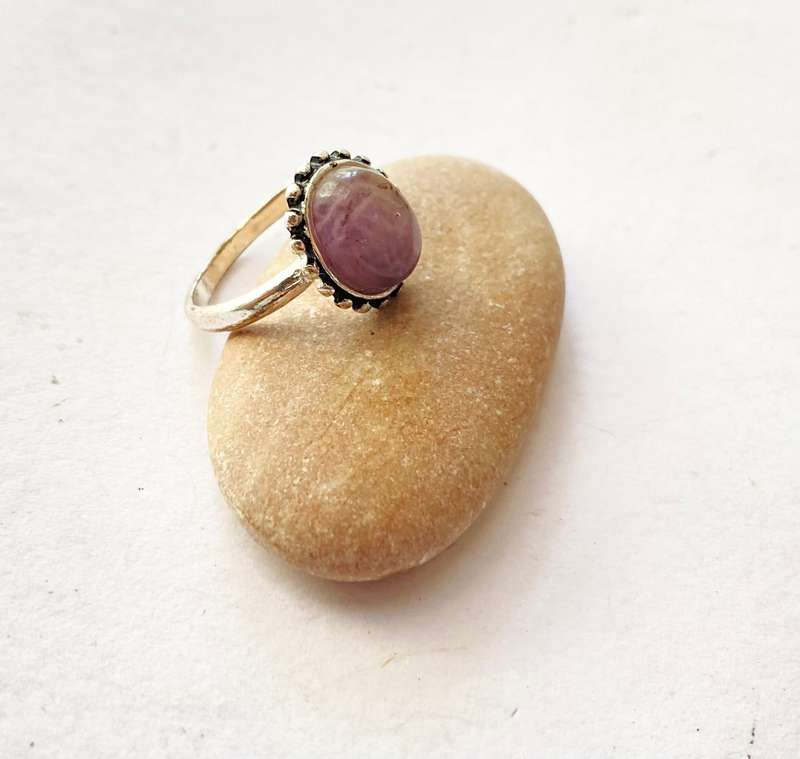 Ring - Band With Central Amethyst Stone Set on Silver Colour Plate. Silver Colour #ML1397
