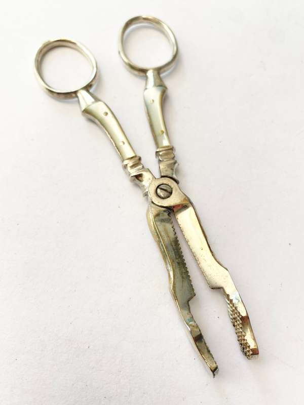 Antiques and Collectibles - Vintage Sugar Cutters / Knippers. Handles have mother of pearl inlay....