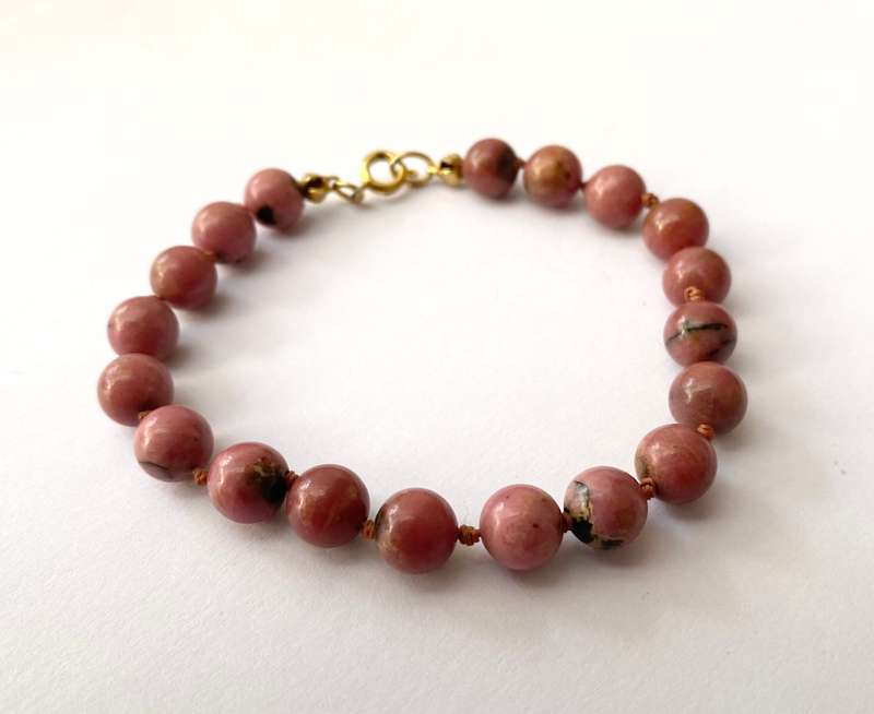 Bracelet - Dusty Pink Coloured Semi-precious stones On Thin Rope. Gold Colour Clasp #ML1609