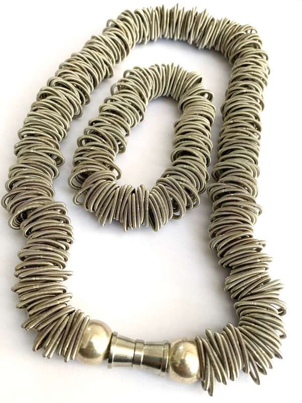 Set - Stretchy Bands Necklace and Bracelet Set. Both On String With Silver Colour Balls. Silver C...
